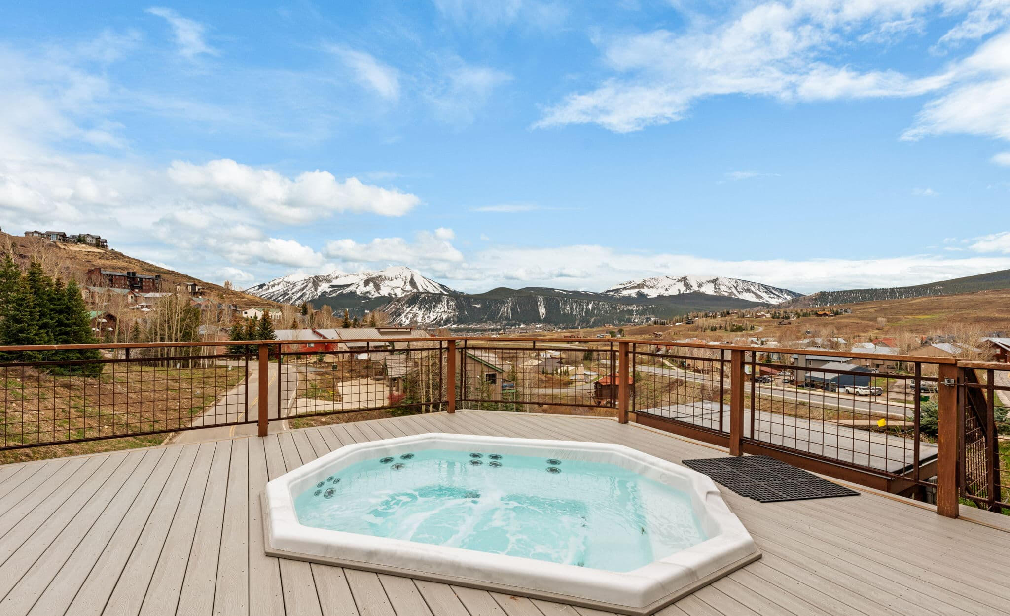 Shared Hot Tub with Valley Views Shared outdoor hot tub at a Mt. Crested Butte condo overlooking a wide open valley and mountain views